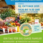 Plakat für den Markt der Region mit Logos und Bild eines gedeckten Tisches.